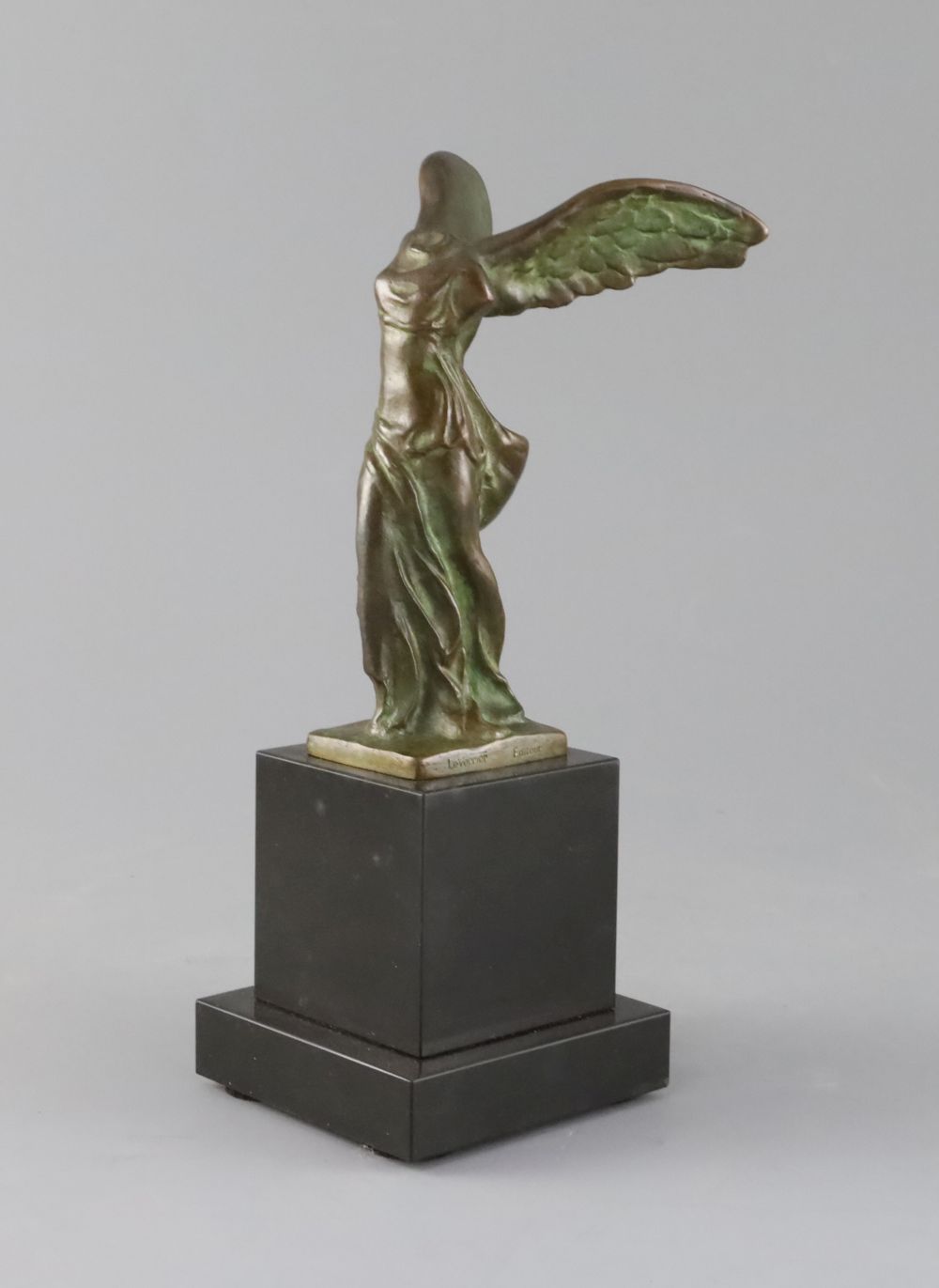 Max Le Verrier (1891-1973). A bronze group La Victoire de Samothrace, on black marble plinth, overall height 23.5cm